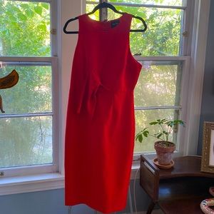 Fitted dress, never worn. Size large, fits sizes 8-10. Very flattering!